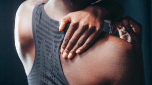 a woman holding her back